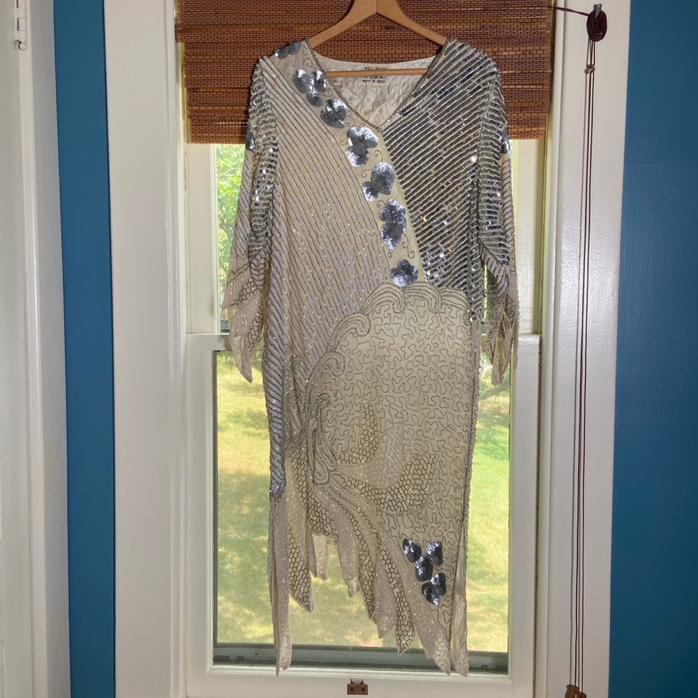1980s Flapper style, asymmetric silk gown with gorgeous beading, sequins.